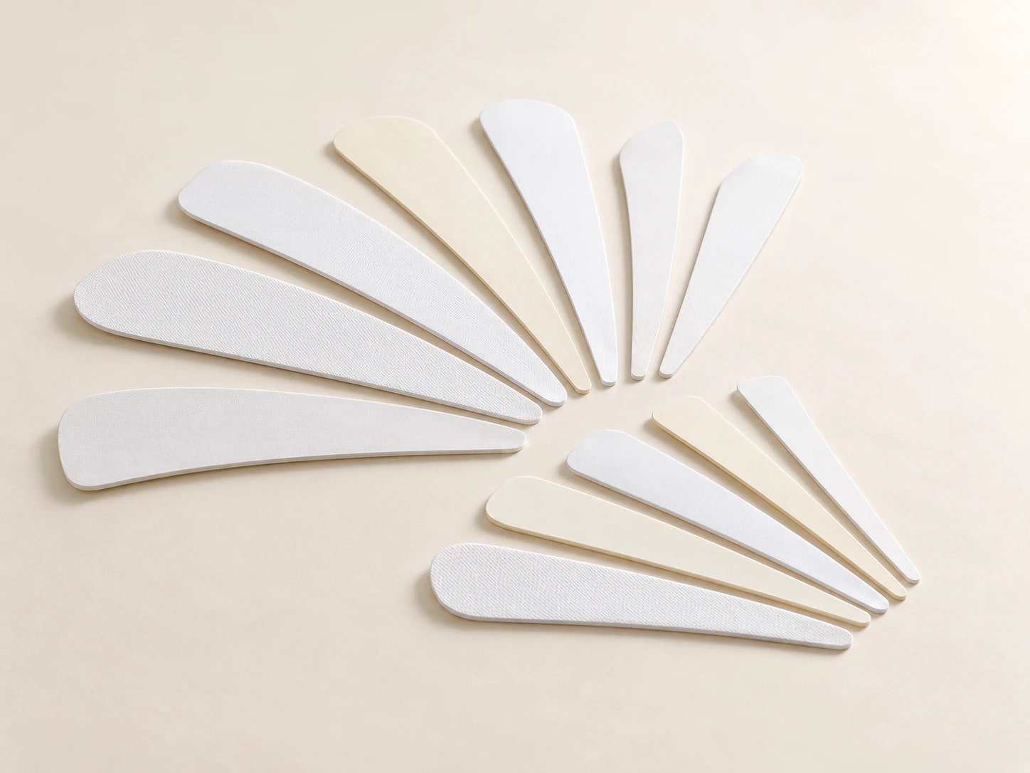 White and cream collar inserts arranged in two fans